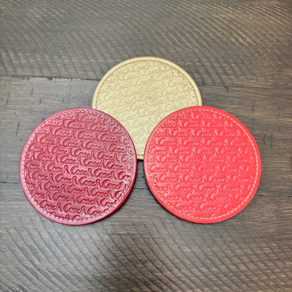 LAST CALL Coach Pinks and Gold Embossed Coaster Set